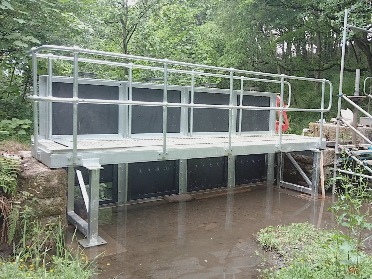 Installed penstock support frame and maintenance platform at the reservoir inlet